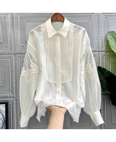 Elegant and Young Woman Blooms White Chiffon Lapel with Bubble Sleeves Relaxed Style Single Breasted Shirt Printed Blouse $50...